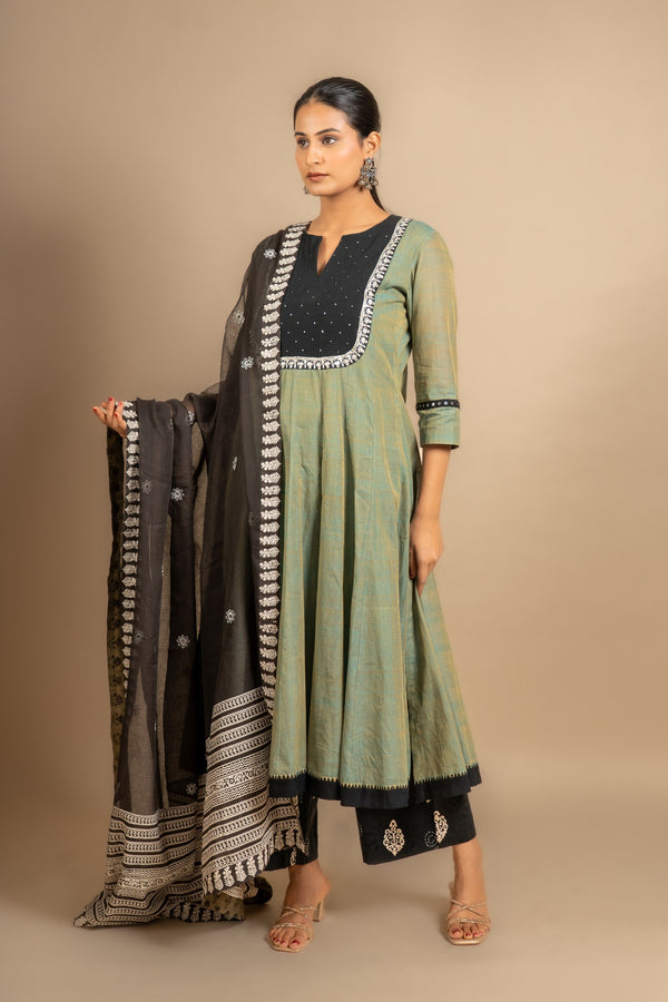 Green with black handloom Kali top mirror and sequin work on yoke with black Kota dupatta with thread work, cotton pant