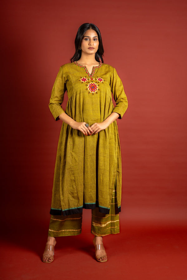 Mehendi green handloom panel with side gather top with thread and mirror work on neck with cotton tie and dye pant