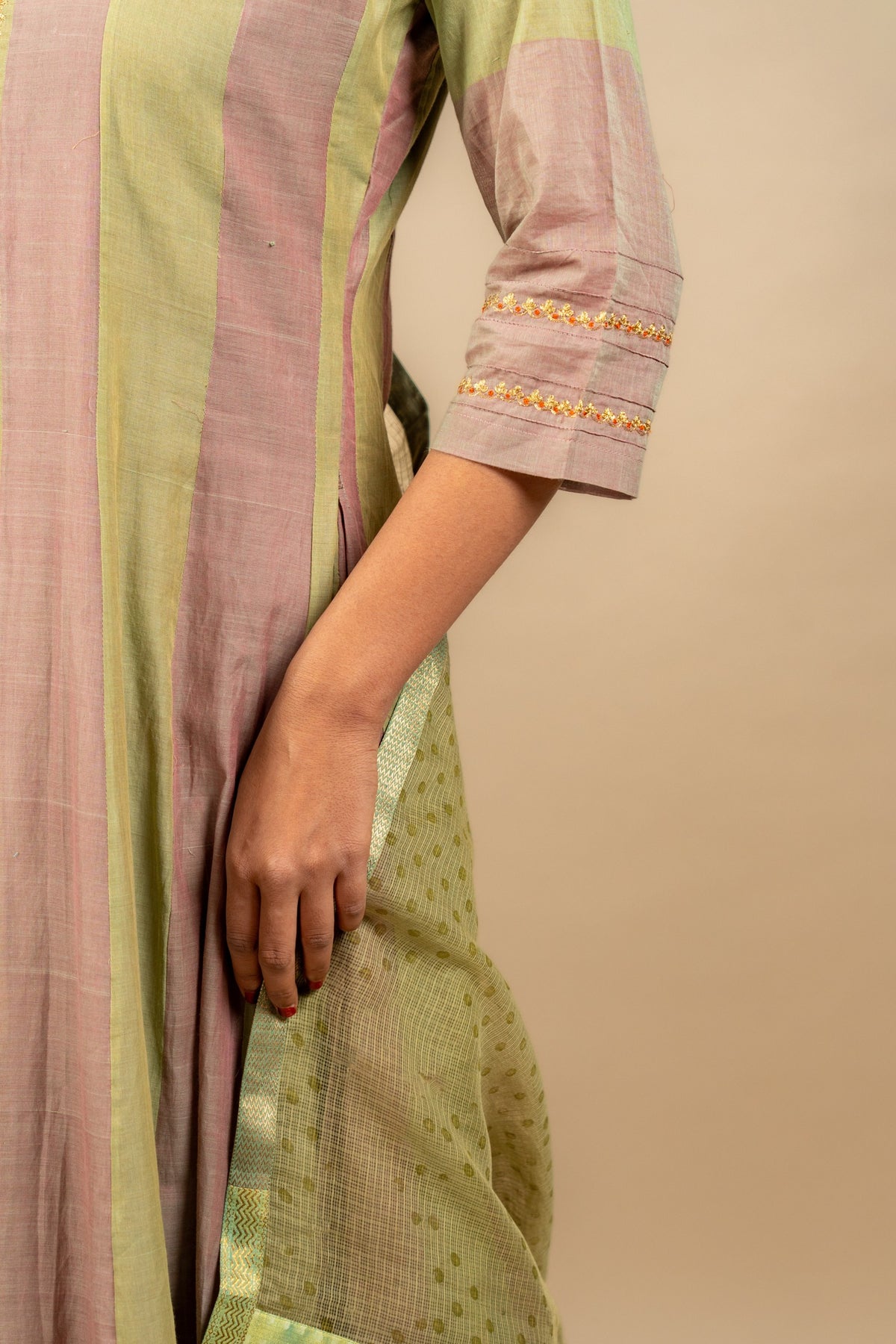 Pink and green Kali handloom top, shikargah appliqué work on the Daman, zari work near the neckline. Kota dupatta with print and cotton pant