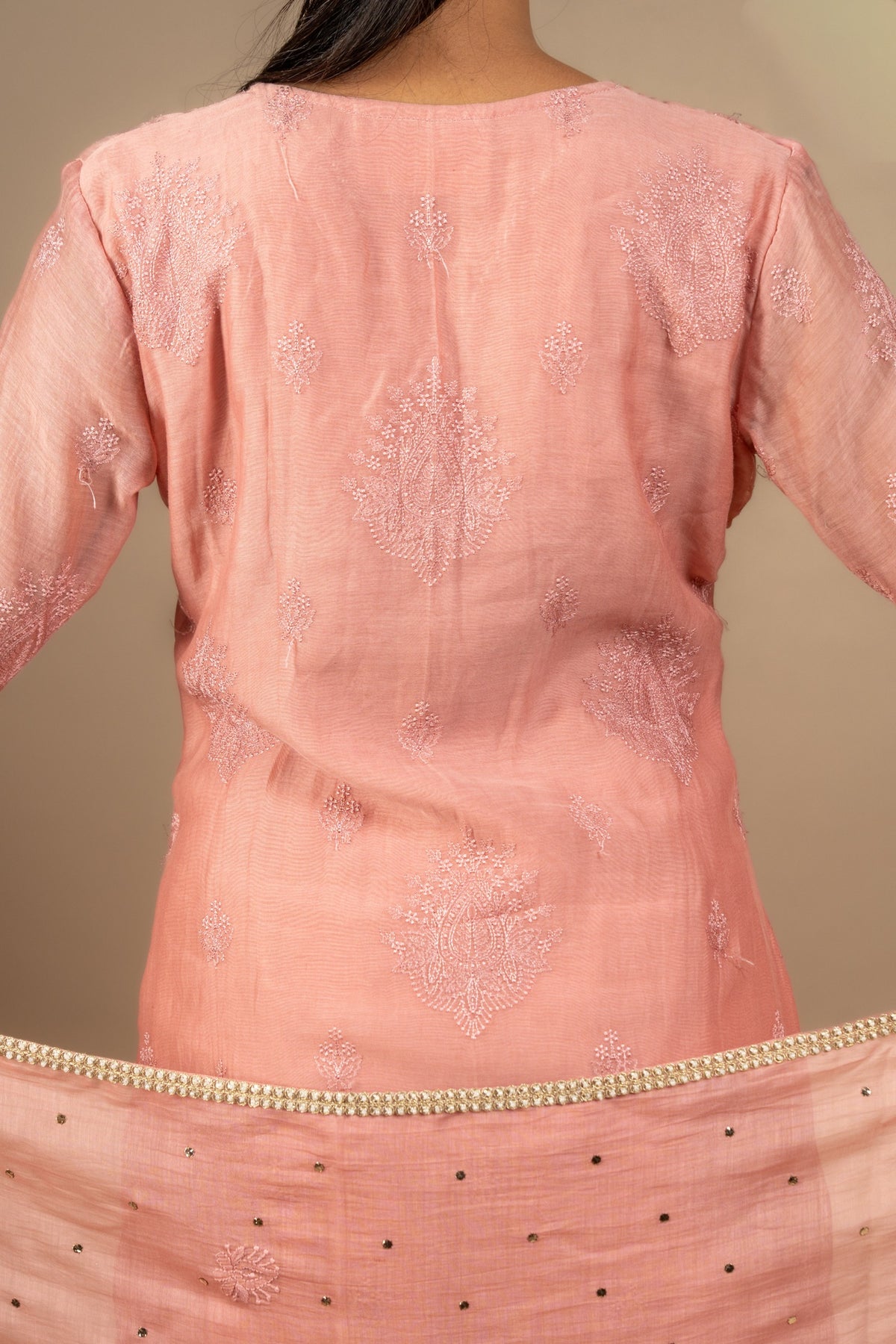 Peach Chanderi cotton with thread buti all over, small detailing on neck and sleeve, same shade Chanderi dupatta Chikankari with Mukesh work and rayon pant