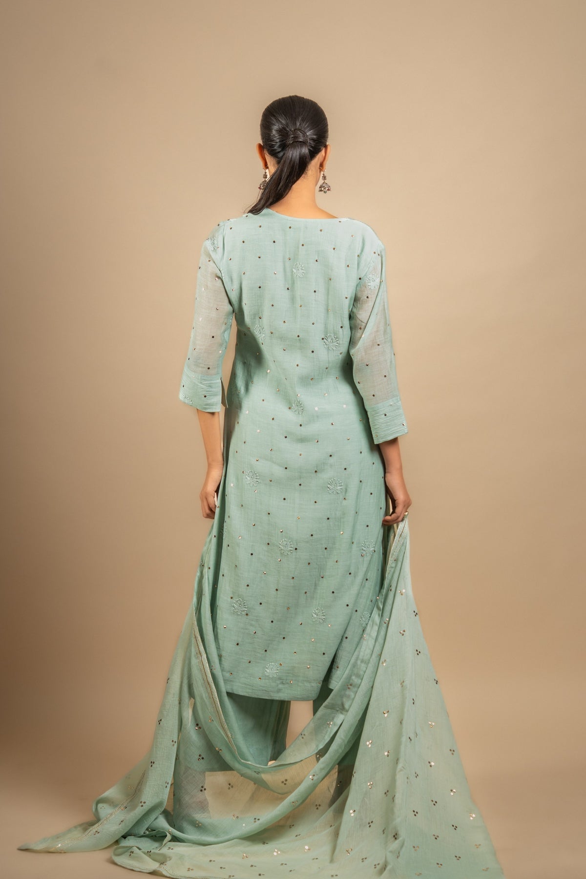 Mint green Chanderi A-line top with Chikankari with Mukesh work, same shade Chanderi dupatta with Mukesh work and rayon pant