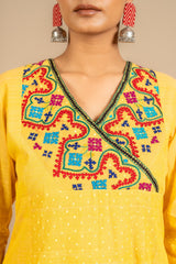 Yellow handloom Kali top with Kutch work overlap on yoke and front panel, tiny mirror work with cotton pant