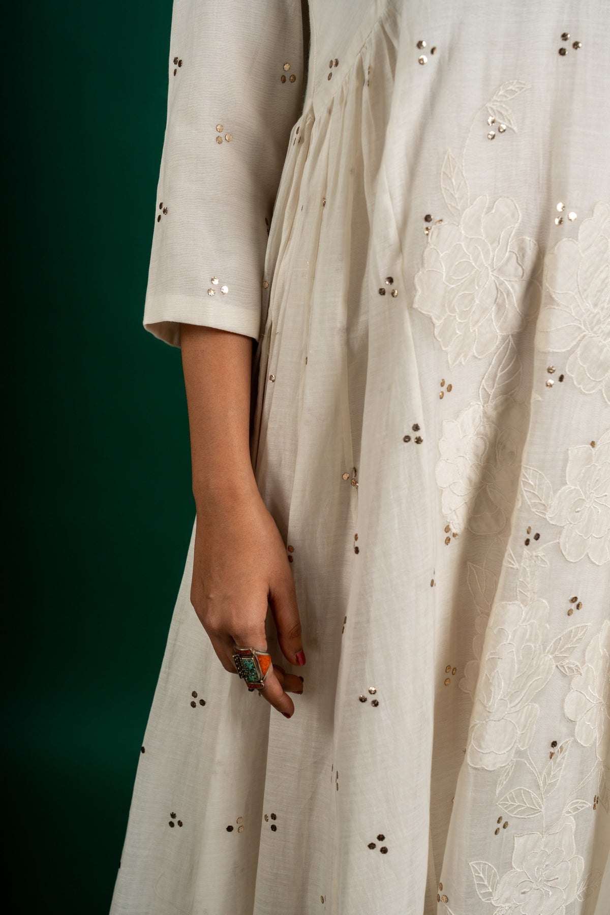 Off white Chanderi cotton panel frock with Mukesh work and centre panel patch work