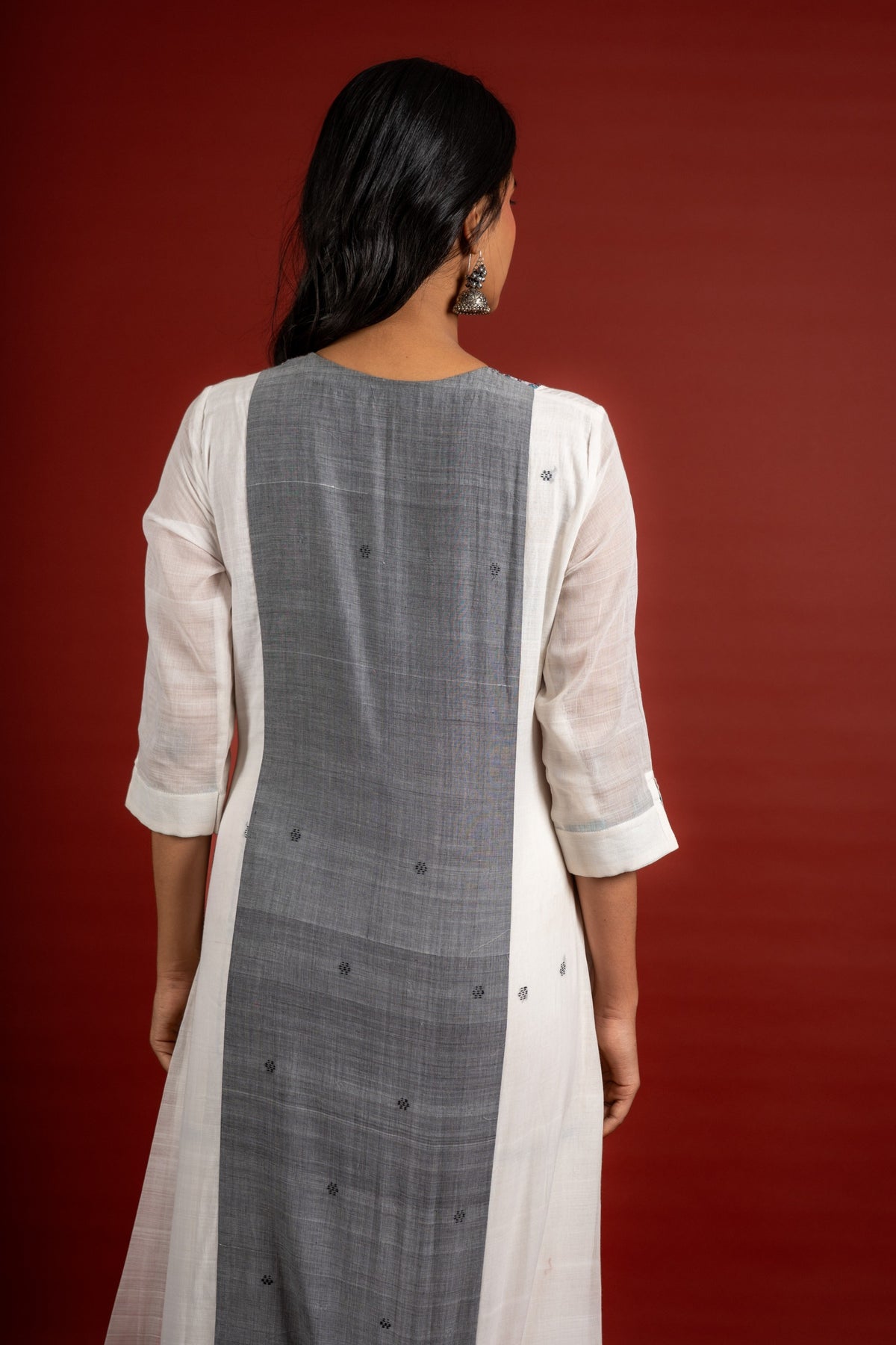 Off white and grey panel handloom top, kanta work on yoke with grey Kota dupatta with mirror work, tie and dye pant