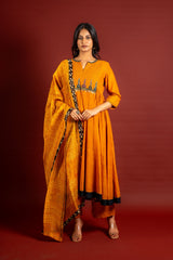 Saffron shade handloom Kali top with kalamkari with tiny mirror work, delicate zari work on neck with Maheshwari dupatta and pant