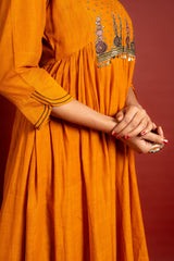 Saffron shade handloom Kali top with kalamkari with tiny mirror work, delicate zari work on neck with Maheshwari dupatta and pant