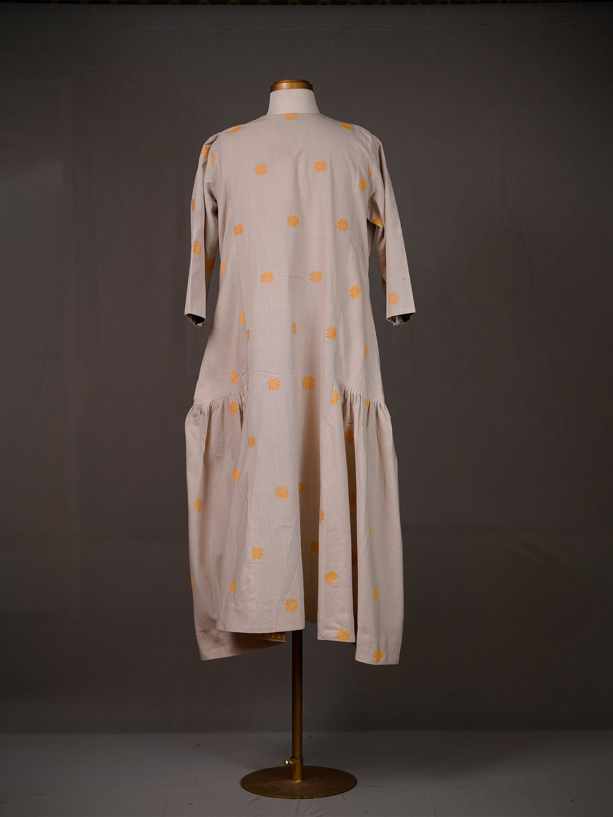 Beige Dress with Side Gathers, Buttis and Thread Work on V Neck