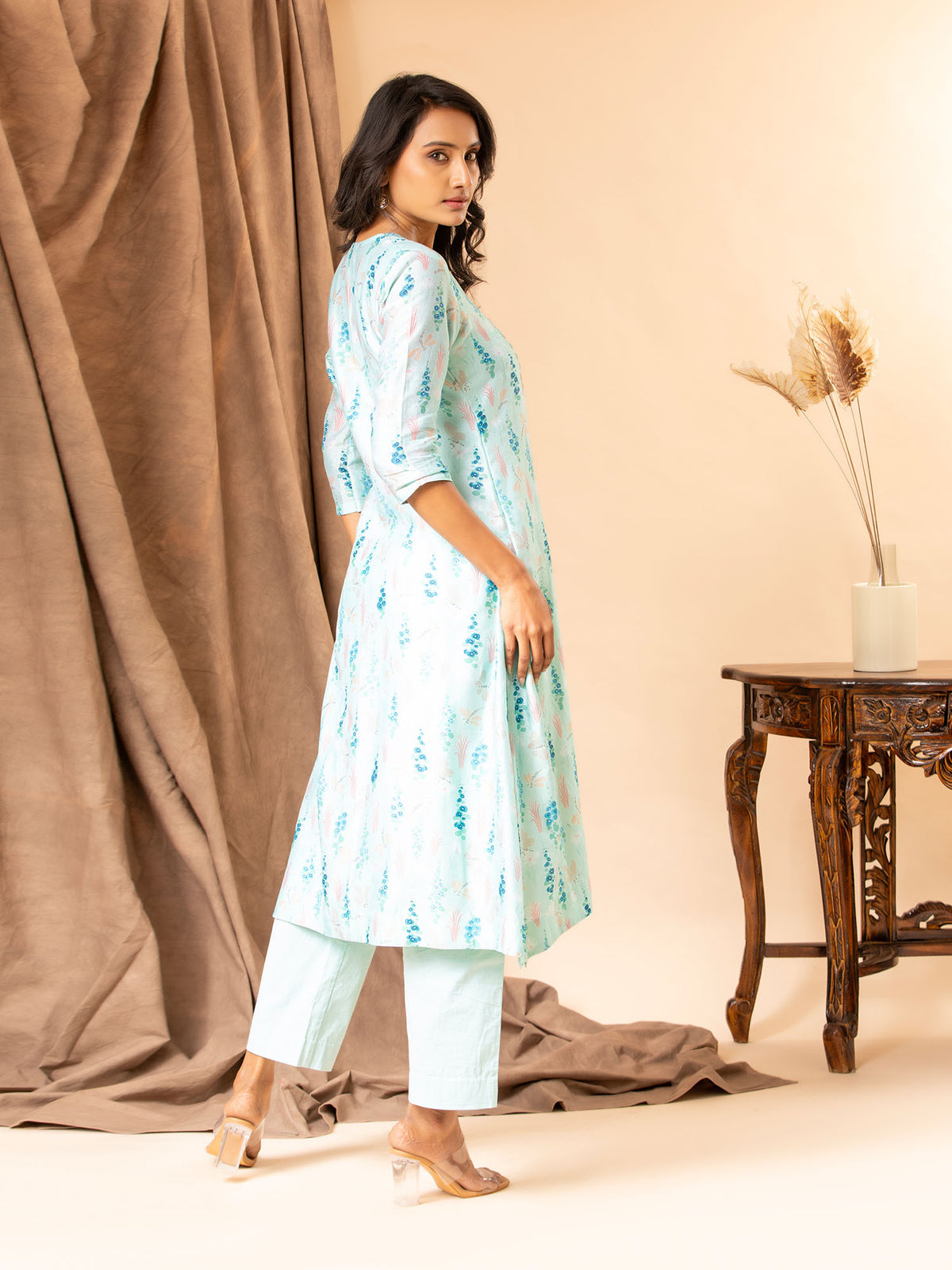 Blue floral printed Chanderi straight cut top with embroidery on the yoke, paired with stretchable Lycra pants