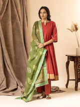 Burnt red handloom checkered kalidar with a green printed Kota dupatta highlighted with sequins, paired with loose pants