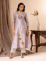 Dusty lavender Chanderi panel top with floral and mirror thread embroidery, paired with lycra stretchable pants