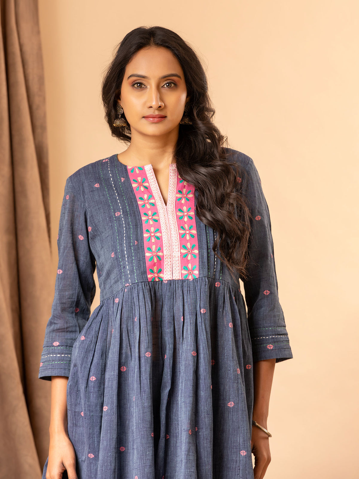 Handwoven muted blue kali top with a gathered design, featuring Kutch work detailing and Kantha anchor work lines