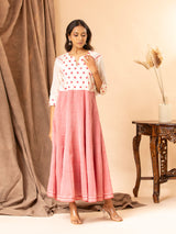 Handwoven white and red kali frock with thread work yoke and intricate thread work lines.