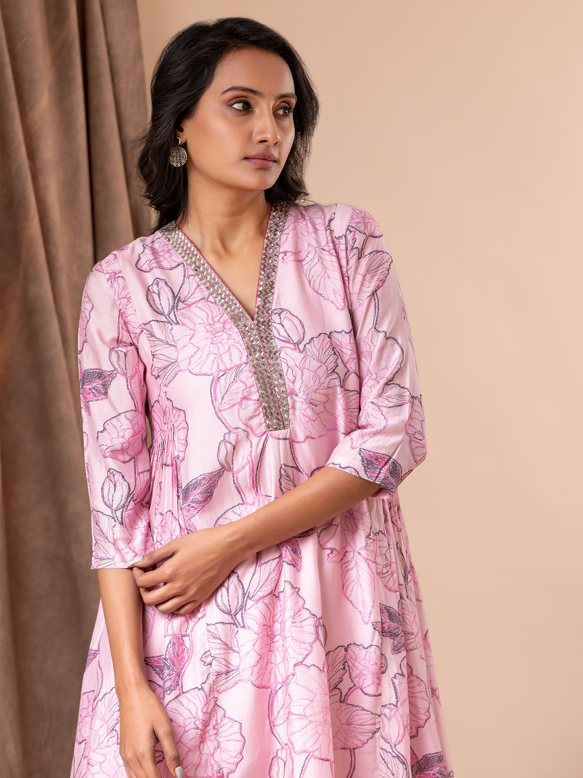 Light pink printed silk sharara top with hand-embroidered neckline, paired with loose sharara pants