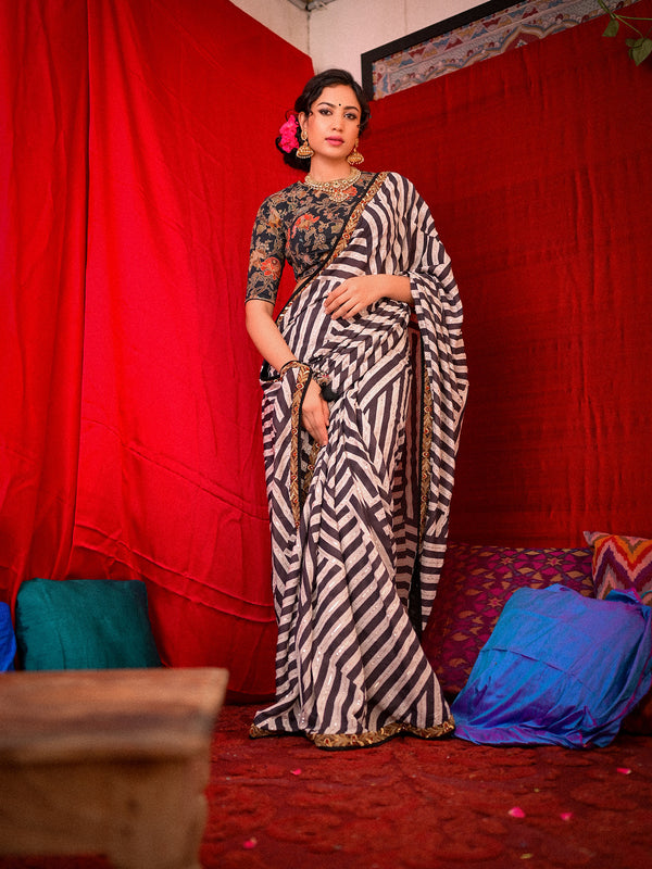 Make a Splash with Stylish Striped Saree and Printed Blouse