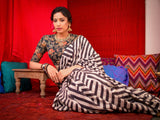 Make a Splash with Stylish Striped Saree and Printed Blouse