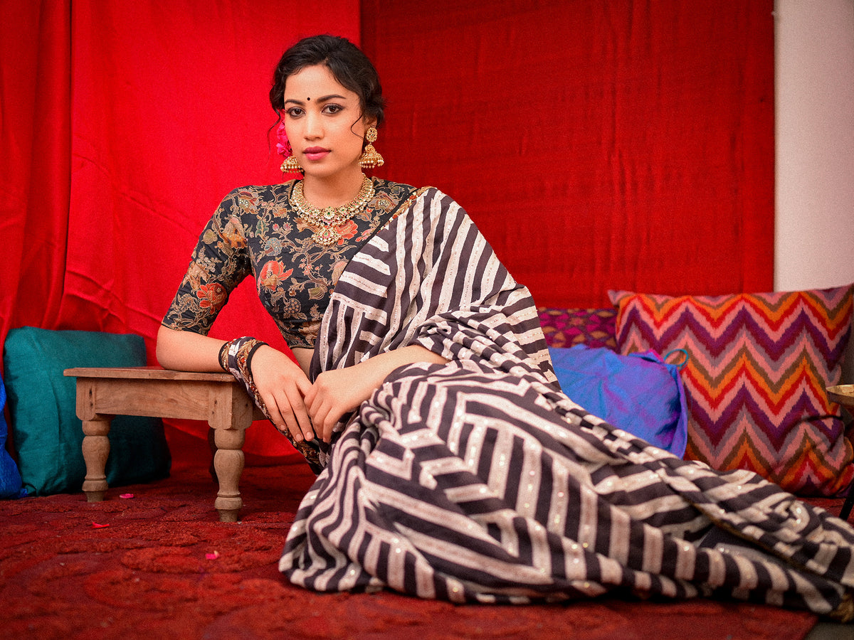 Make a Splash with Stylish Striped Saree and Printed Blouse