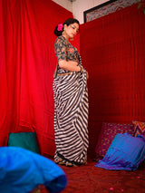 Make a Splash with Stylish Striped Saree and Printed Blouse
