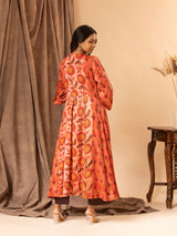 Mushroo printed silk gathered and panel top in burnt orange, with detailing on the yoke, paired with plain brown stretchable pants