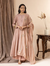 Muted sand pink muslin top with Gota detailing on the sleeves, paired with a intricate feather detailing handembroidered dupatta