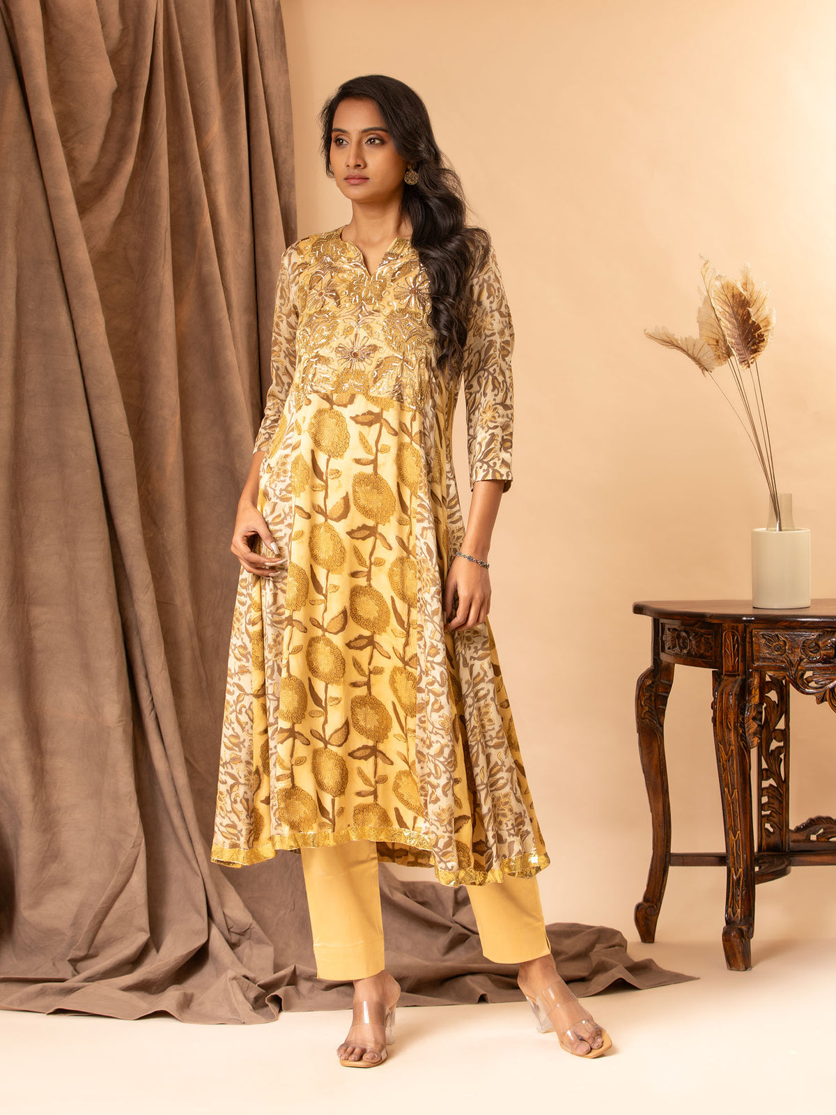 Printed Mushroo panel top with sequin work on the yoke, paired with straight pants