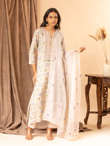 Printed linen top with handembroidered thread and mirror work on the yoke, paired with a Kota dupatta featuring thread work and matching pants