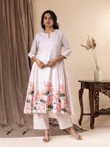 Soft blush pink mul gathered top with lotus applique work, highlighted with sequins, paired with pants