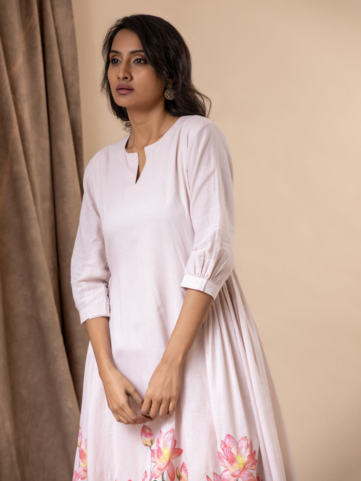 Soft blush pink mul gathered top with lotus applique work, highlighted with sequins, paired with pants